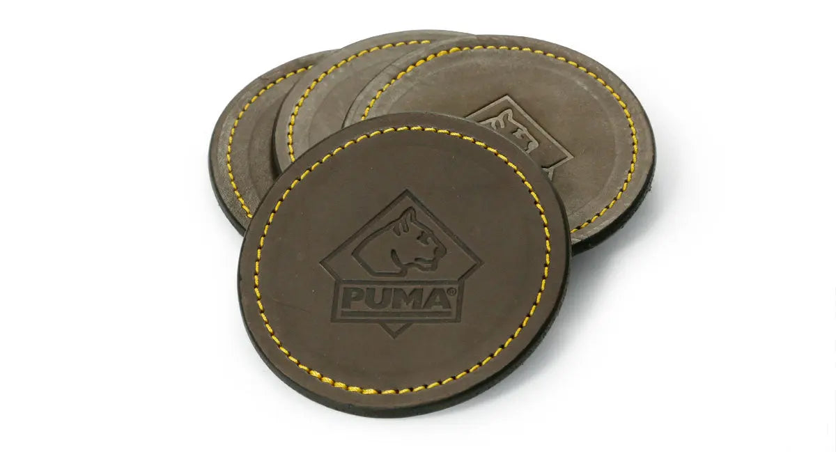 puma-leder-untersetzer-goldnaht-sattelleder-4er-set-rund image 1