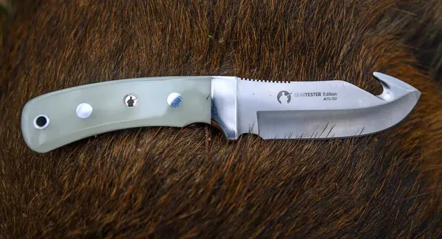 puma-schwarzwild-acryl-fluoreszierend-jagdmesser-limitiert image 1